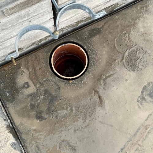 Belægning rundt om nedløbsrør ved terrasse i Silkeborg